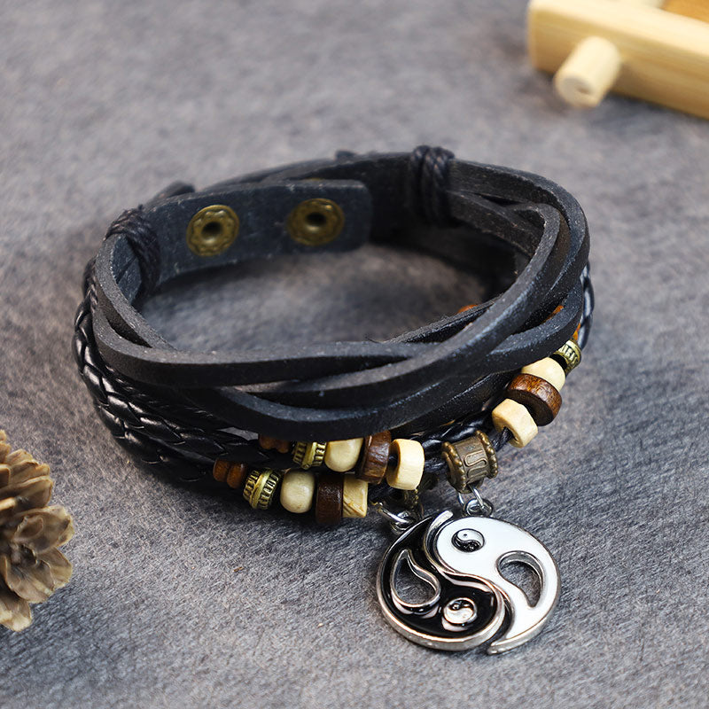 Schwarzes Leder Armband Yin Yang Drachen Anhänger Holzperlen Flat Lay
