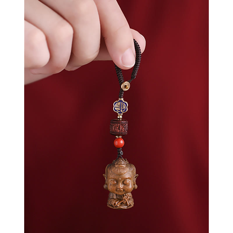 Schlüsselanhänger Buddha Sandelholz Om Mani handgeschnitzt Glücksbringer spirituell Anhänger