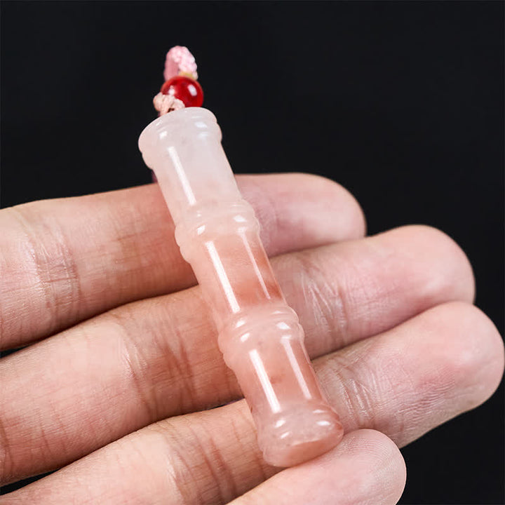 Rosenquarz Buddha Anhänger Kette rosa Schutz Naturstein in Hand