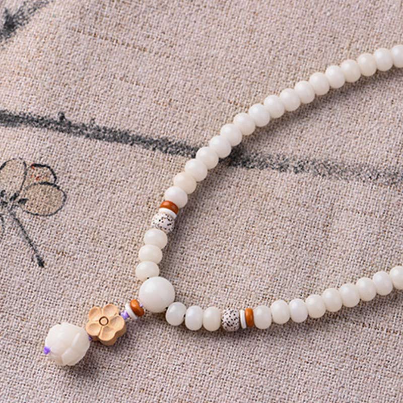 Armband Weiße Jade Bodhi Lotus – Segen mit orangefarbenen Akzenten