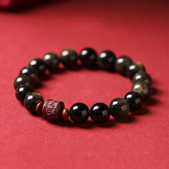 Schwarzes Obsidian Armband mit Om Mani Padme Hum Holzperle elegant