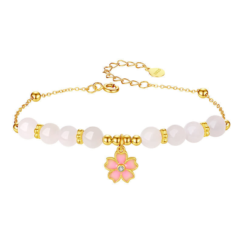 Armband 925 Silber weiße Jade rosa Blütenanhänger goldfarbig elegant
