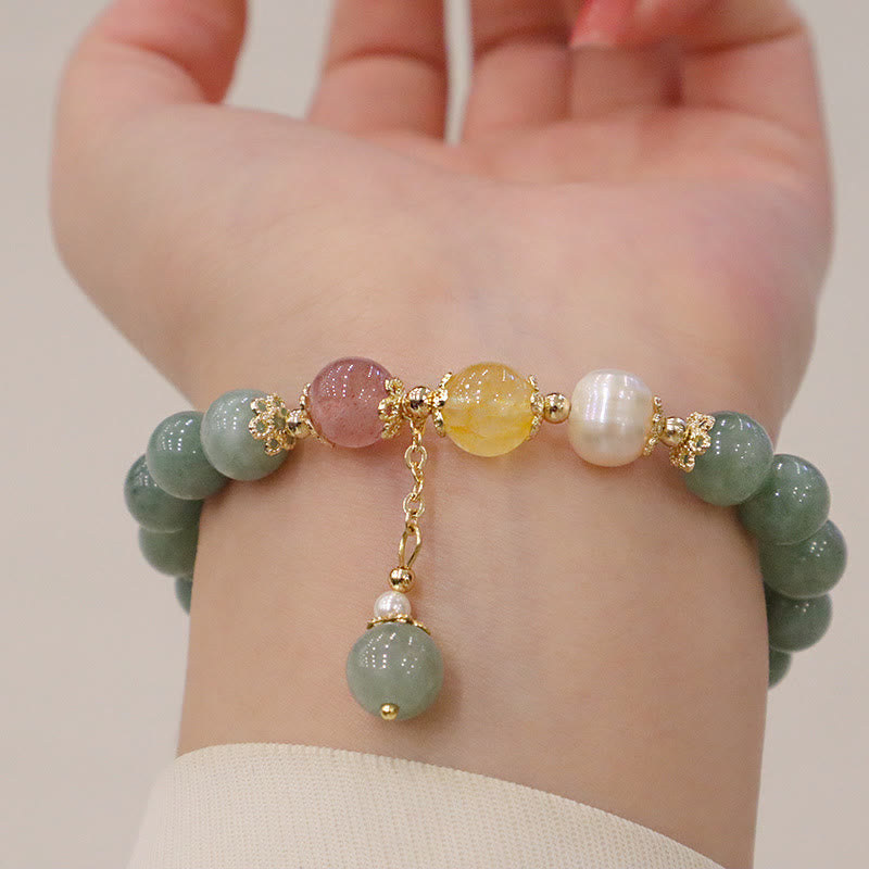 Armband Erdbeerquarz Perle Glück Fülle grüner Stein elegant getragen