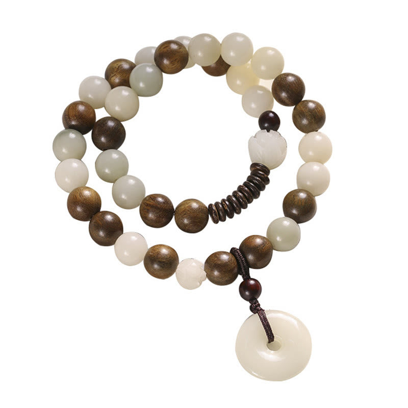 Armband Sandelholz Bodhi Lotus mit cremefarbenen und braunen Perlen Pendant