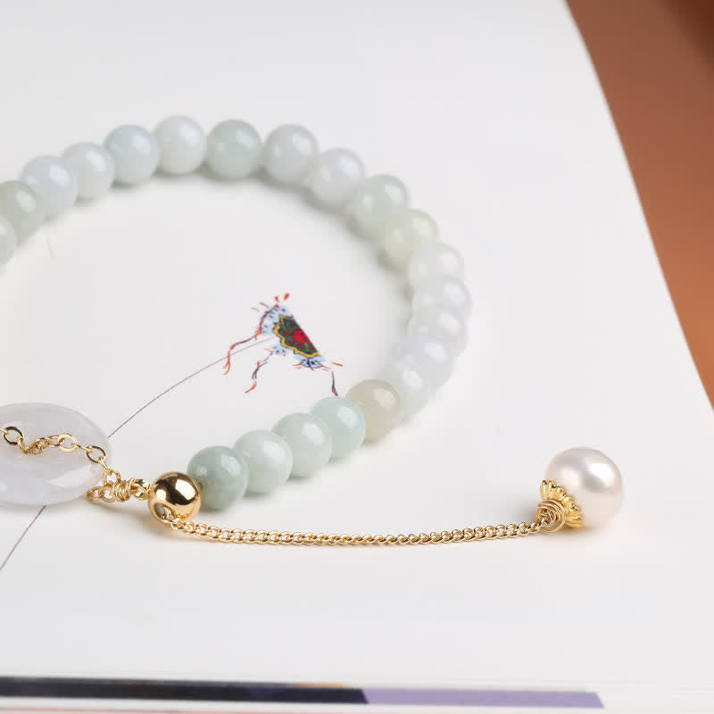 Armband Perle Jade – Glück & Frieden mit goldenen Elementen elegant gestylt