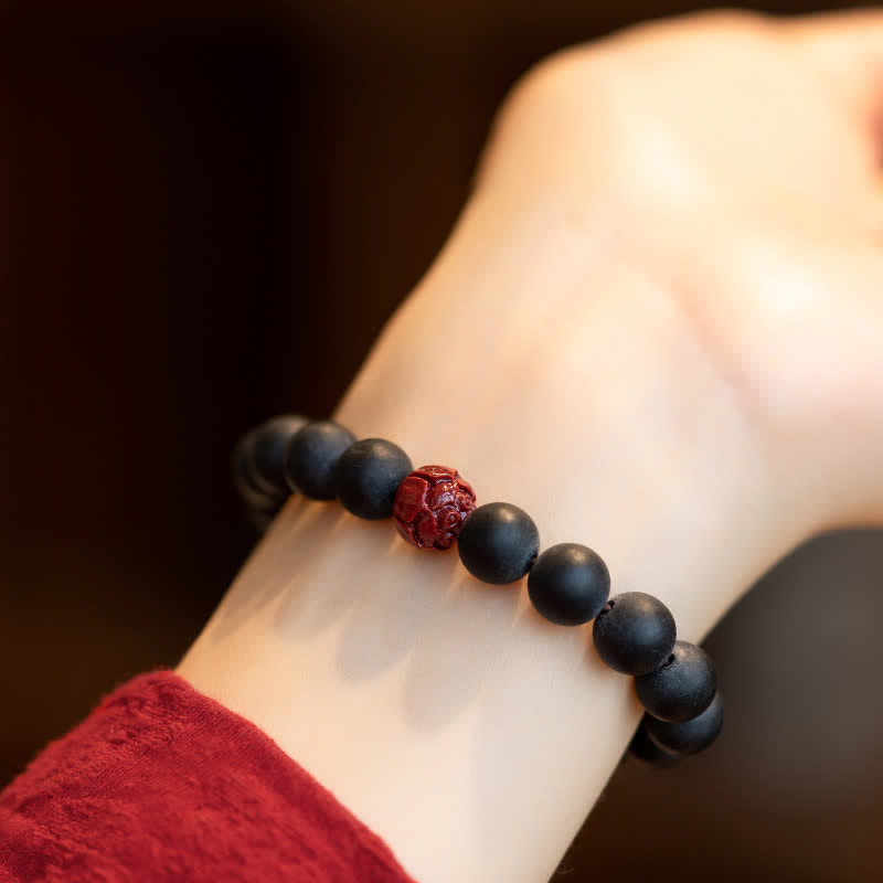 Armband Zinnober Lotus – Heilung mit schwarzen Perlen elegantes Design