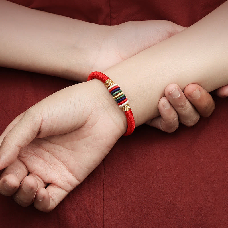 Rotes Armband Fünf Elemente – Glück & Energie am Handgelenk getragen Kind