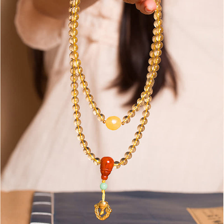 Mala 925 Silber Roter Achat Halskette mit goldenen Perlen getragen