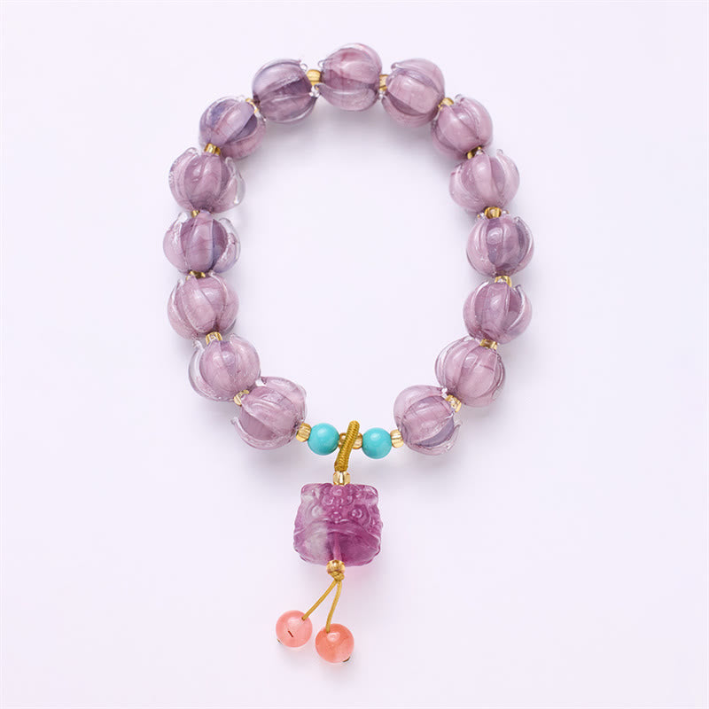 Armband Fluorit Lotus lila Perlen türkis Achat Anhänger elastisch
