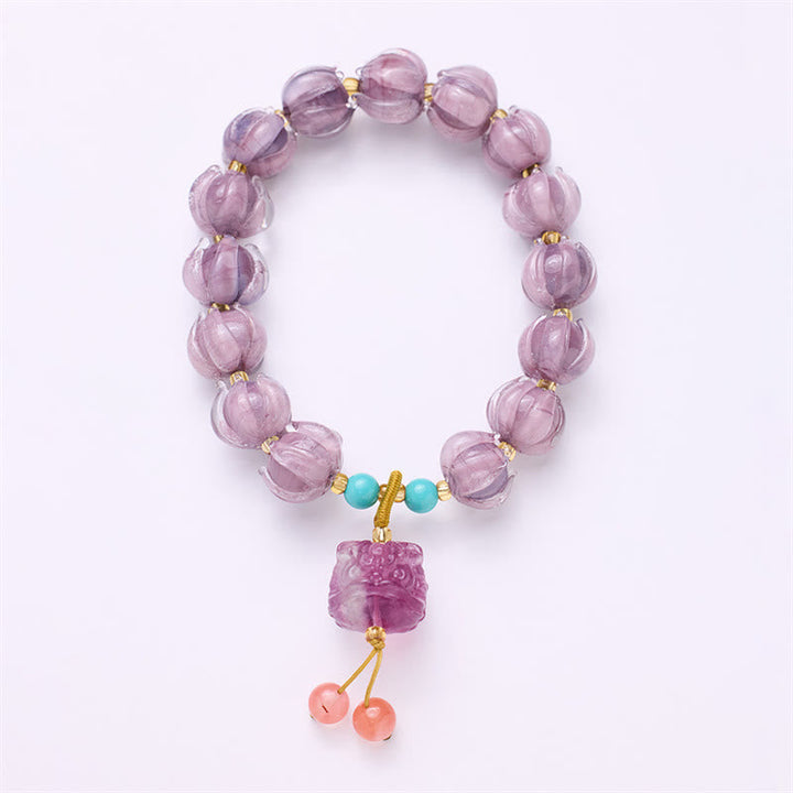 Armband Fluorit Lotus lila Perlen türkis Achat Anhänger elastisch