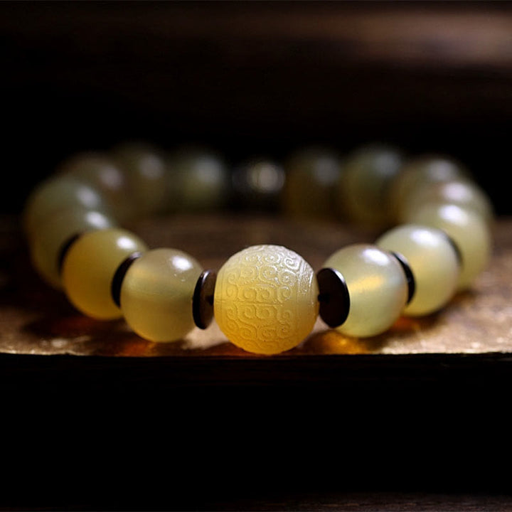 Gelbes Jade Armband mit Om Mani Padme Hum Gravur Segen