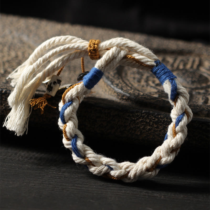 Armband – Glück & Wohlstand & Stärke aus geflochtenem Seil mit blauen Akzenten