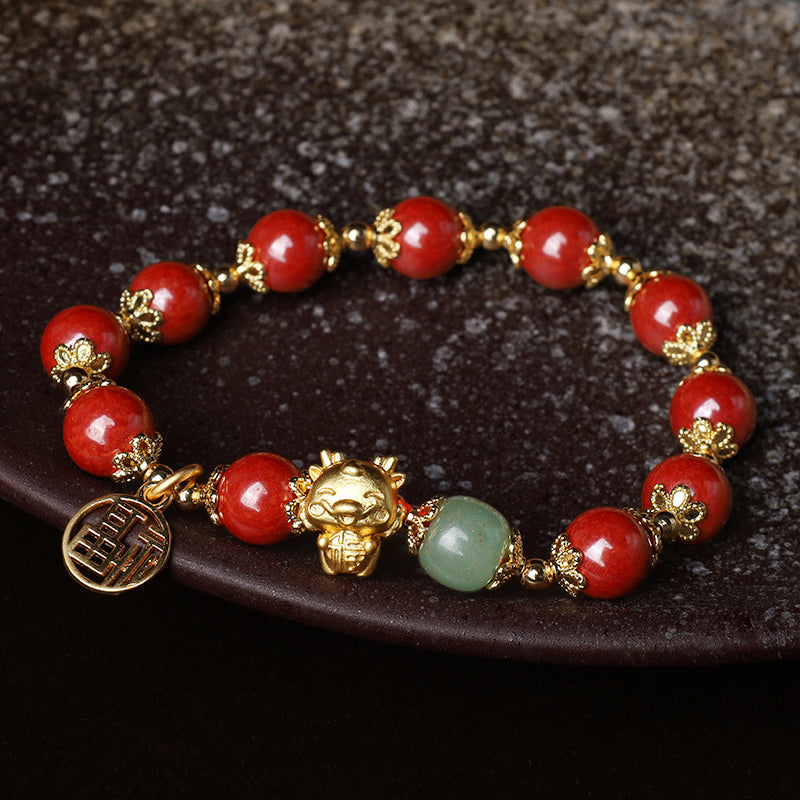 Rotes Armband Zinnober Fu-Zeichen Gold Perlen Segen Balance elegantes Design