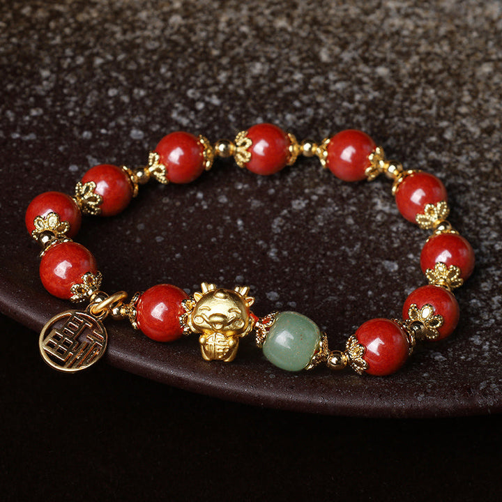 Rotes Armband Zinnober Fu-Zeichen Gold Perlen Segen Balance elegantes Design