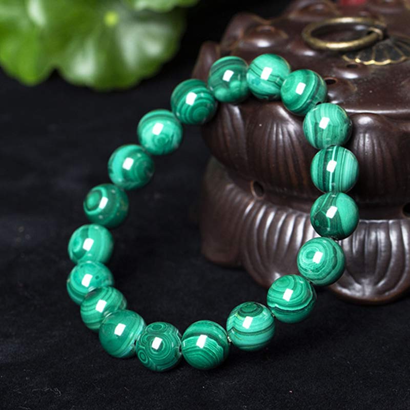 Mala Malachit Armband grüne Perlen Naturstein glänzend elegante Ausstellung