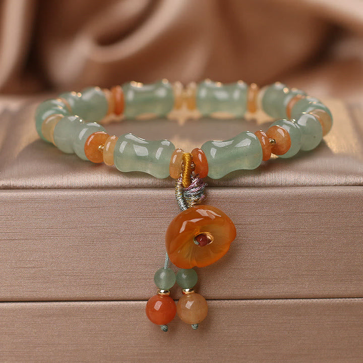 Armband Jade Bambus – Glück mit grünem Stein und orange Perlen
