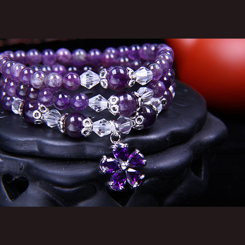 Armband Amethyst – Segen mit klaren Kristallperlen elegant gestylt