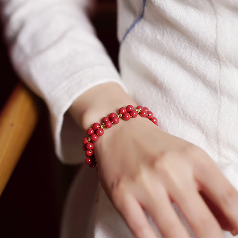 Armband Zinnober – Segen Harmonie rotes Perlenarmband Handgelenk getragen elegant
