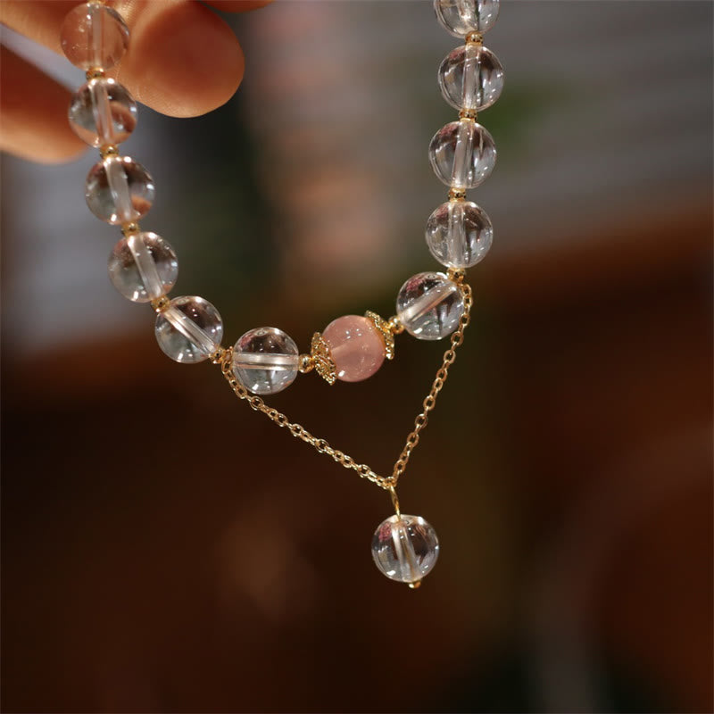 Elegantes Kristallarmband mit rosafarbenen und transparenten facettierten Perlen.