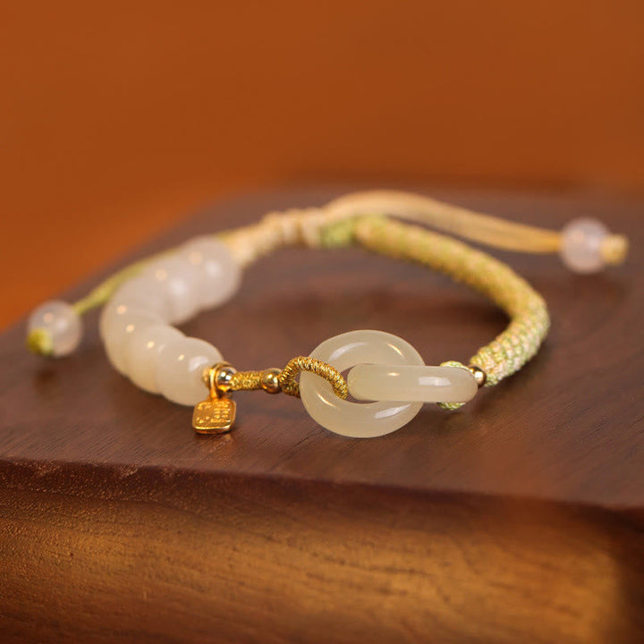Jade Fu-Zeichen Armband Handgelenk Naturstein gelb elastisch getragen