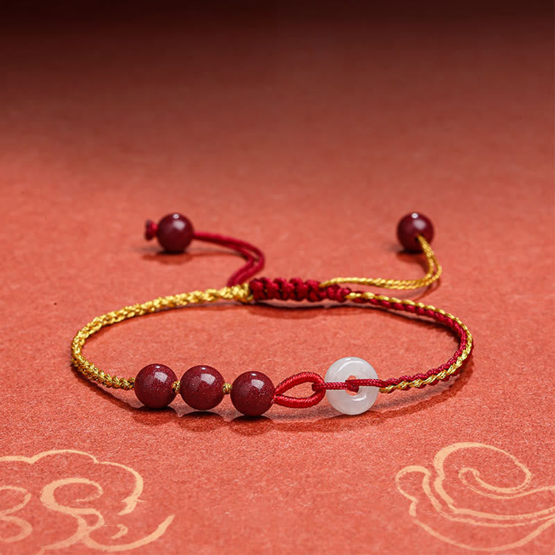 Armband Zinnober Jade mit roten Perlen weißem Stein elegantes Design