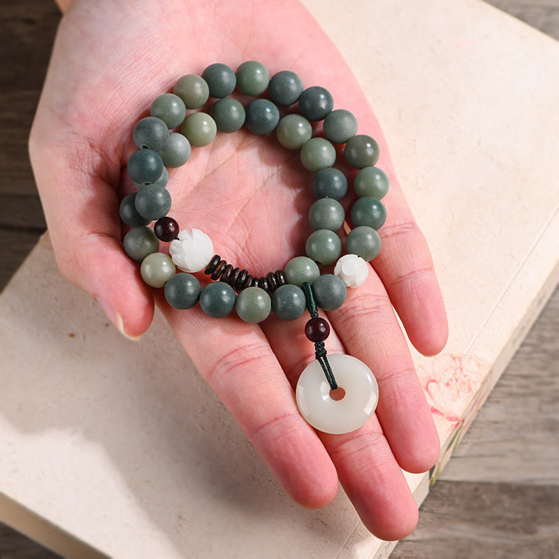 Armband Bodhi Jade Lotus – Frieden grüne Steine Naturstein Handgelenk getragen
