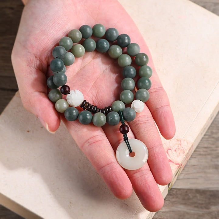 Armband Bodhi Jade Lotus – Frieden grüne Steine Naturstein Handgelenk getragen