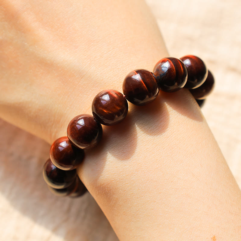 Armband Tigerauge – Heilung & Energie braune glänzende Kugeln Handgelenk