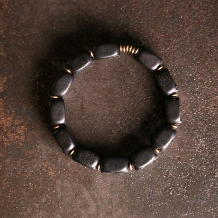 Armband Kupfer Ebenholz schwarze Perlen mit goldenen Akzenten elegant