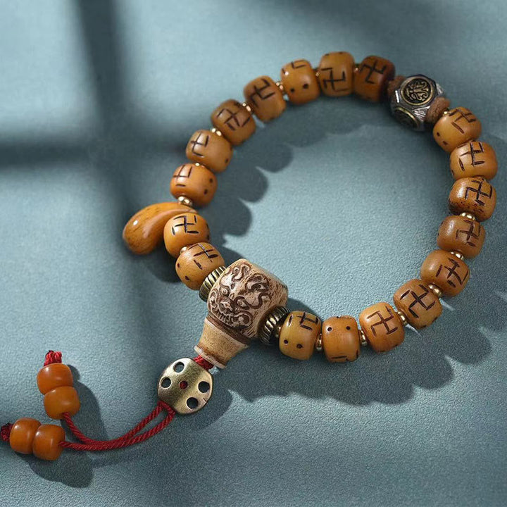Armband Kamelknochen mit Schutz-Anhänger und roten Quasten elastisch