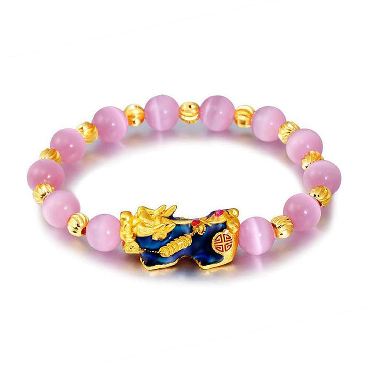 Pixiu Armband mit rosa Steinen und goldenem Verschluss Glück