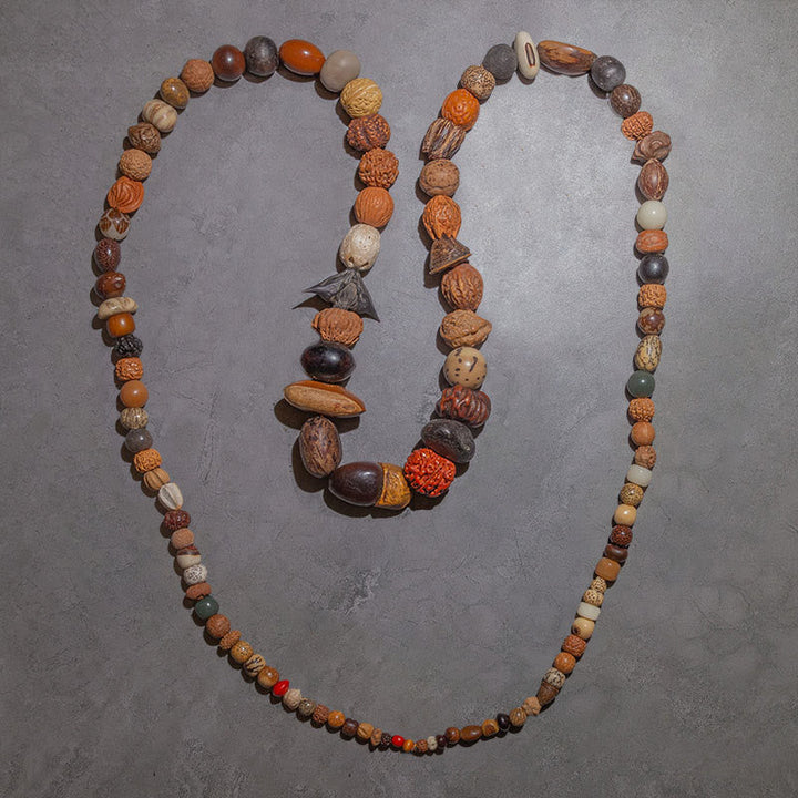 Mala Bodhi Glück Wohlstand Halskette Naturholzperlen braun handgefertigt.