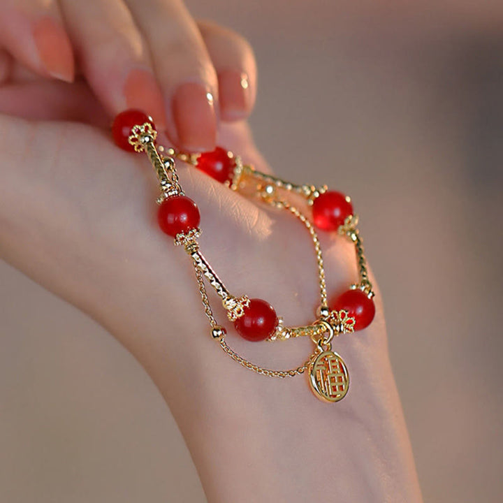 Armband Roter Achat Fu-Zeichen goldkette Hand elegant getragen