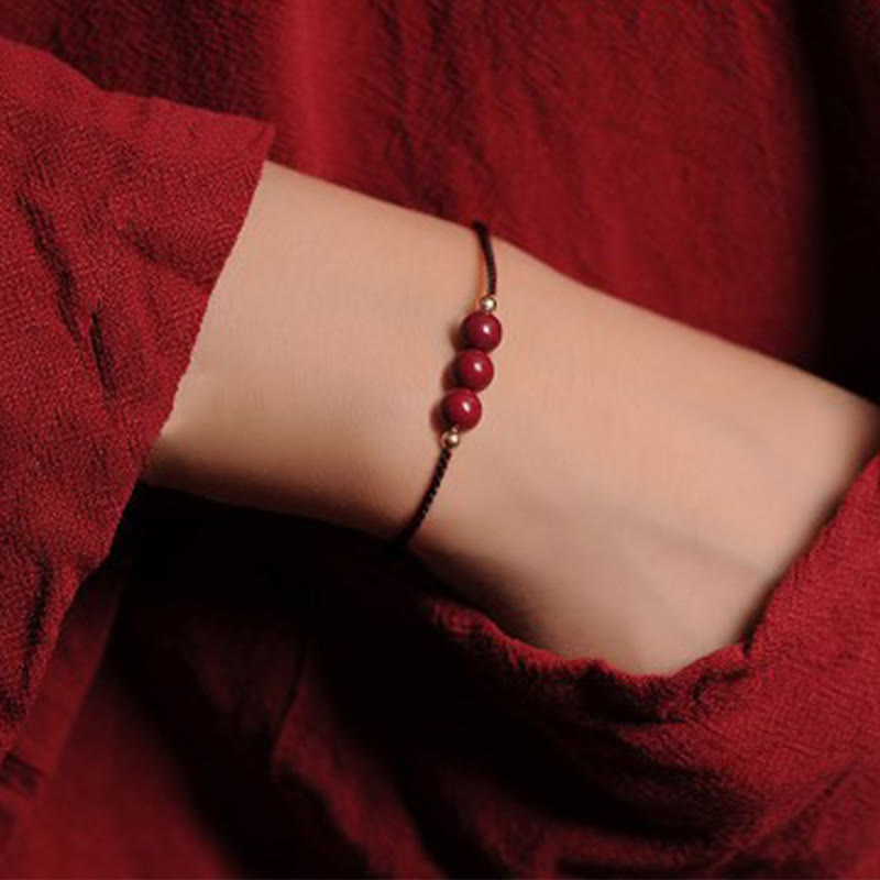 Armband Zinnober – Segen & Segen rote Perlen elastisch Handgelenk getragen