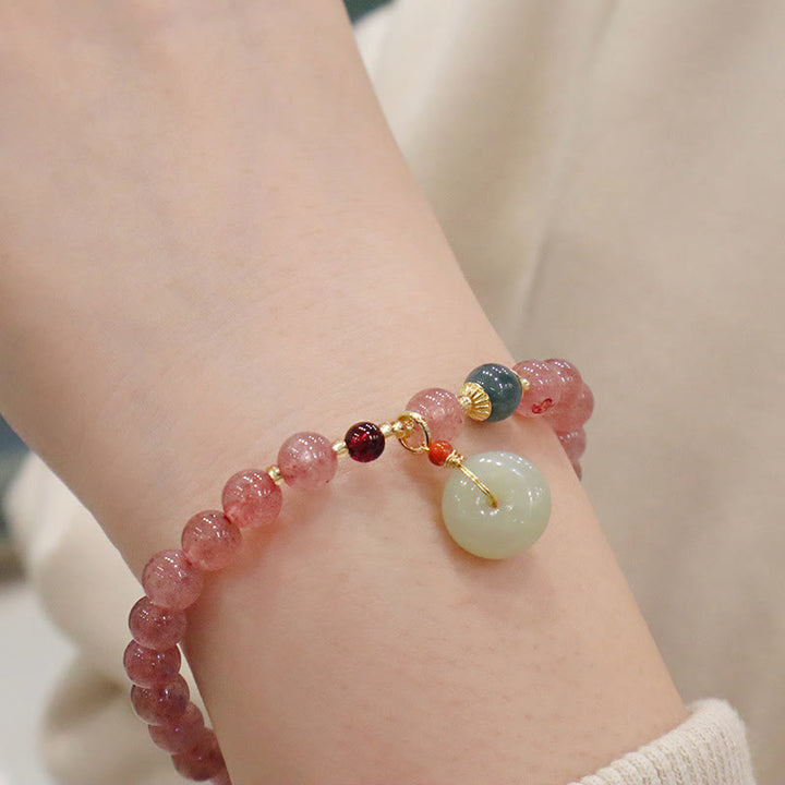 Armband Erdbeerquarz Jade Heilstein elastisch Perlen Anhänger Handgelenk getragen