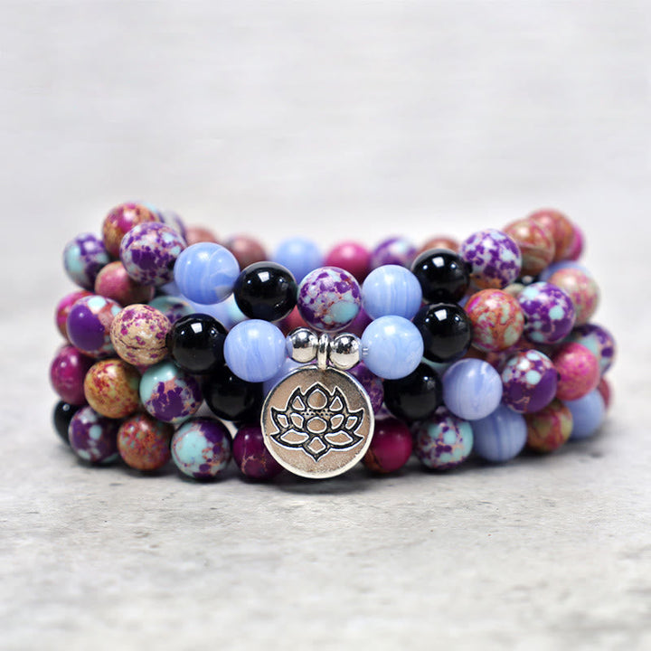 Armband Lila Miano Real Lotus mit Perlen Flachansicht Natursteine lila schwarz blau