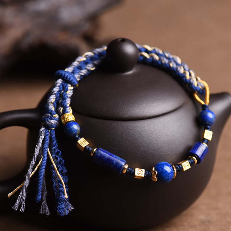 Armband Lazurit Perle Positiv mit goldenen Akzenten und Quaste Schmuck