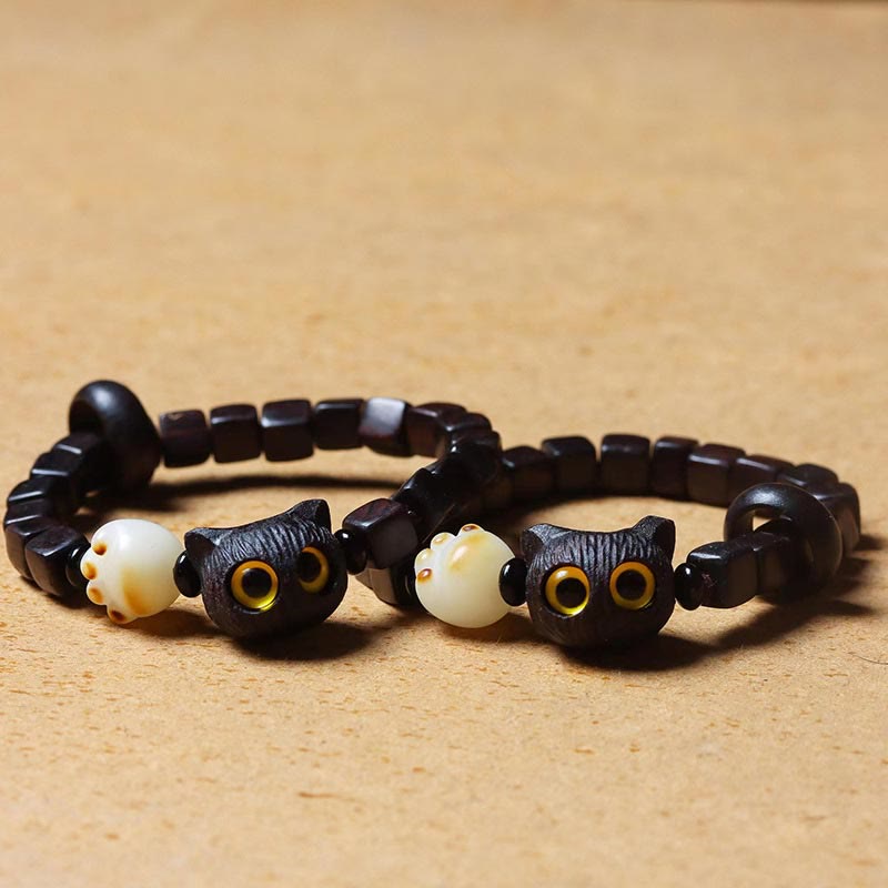 Armband Bodhi Ebenholz Katze mit weißen Perlen elastisch