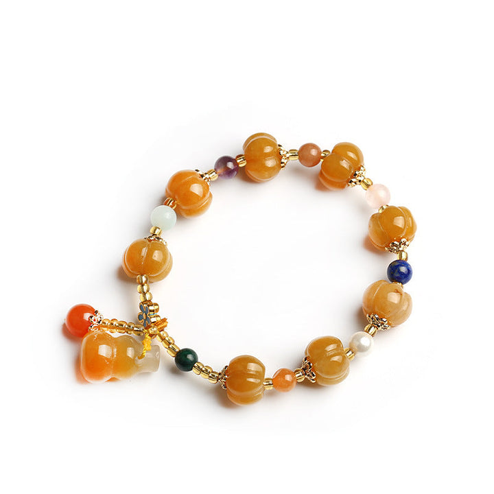 Jade Pixiu Armband mit orangefarbenen Steinen und Glücksbringer Anhänger