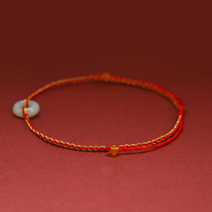Rotes Armband Jade – Glück & Frieden mit goldenem Faden elastisch