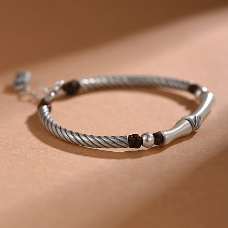 Armband 925 Silber Bambus mit braunen Perlen elegant am Handgelenk getragen