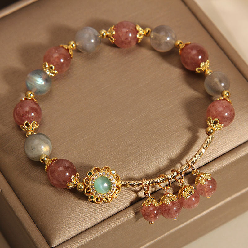 Armband Erdbeerquarz Mondstein Mond Heilung Goldperlen elegant.