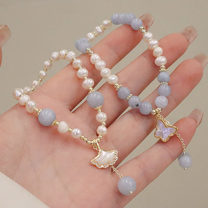Armband Aquamarin Perle Schmetterling Heilung handgetragen elegant zartweiß