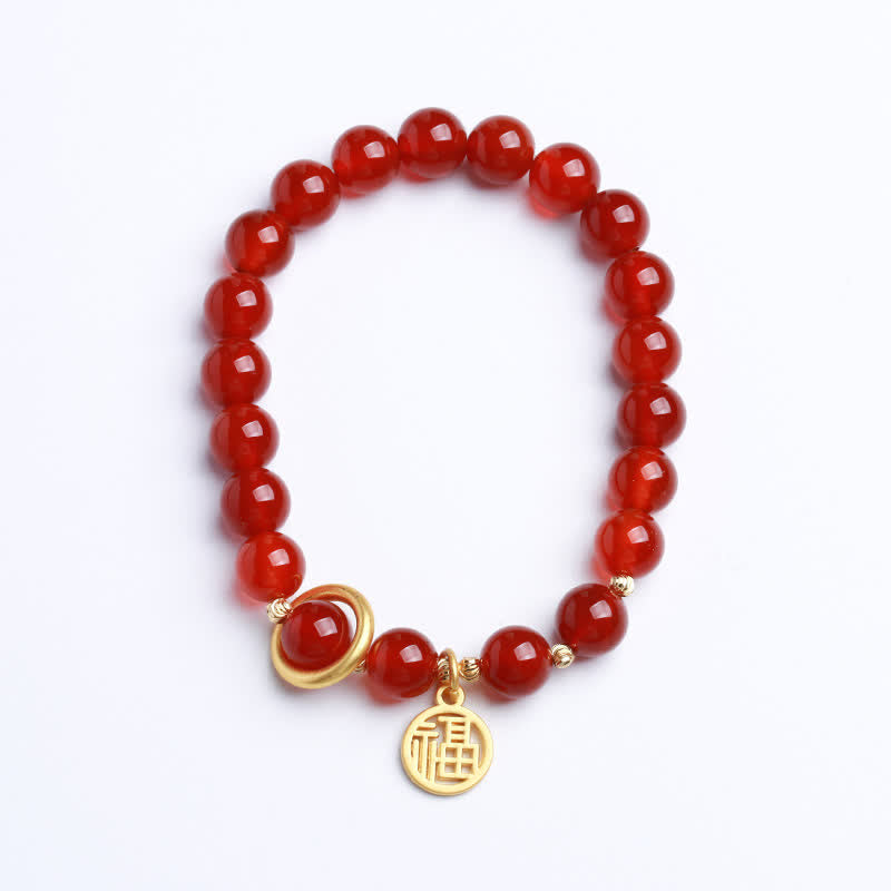 Armband Roter Achat mit goldenem Segen Anhänger elastisch