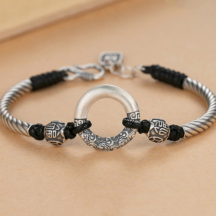 Armband 925 Silber Kupfer Fu-Zeichen Frieden Glück schwarze Kordel getragen