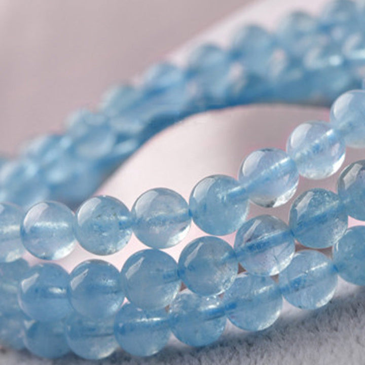Armband Aquamarin – Heilung & Frieden hellblaue Perlen Naturstein elastisch