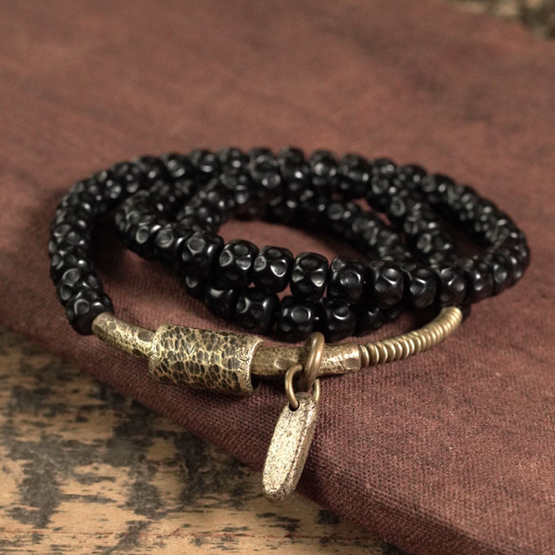 Schwarzes Perlen Armband Kupfer Retro Coconut Glück elastisch getragen