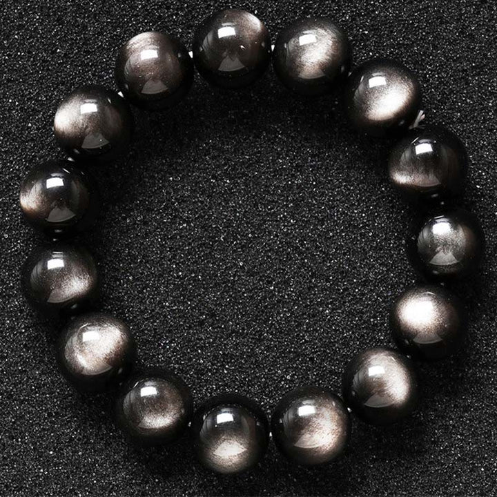 Obsidian Armband Silber schwarze Perlen Schutz elastisch Flachaufnahme Draufsicht
