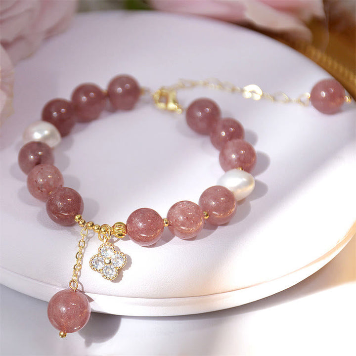 Armband Erdbeerquarz Perle Kleeblatt rosé Goldfarben elegant Schmuck