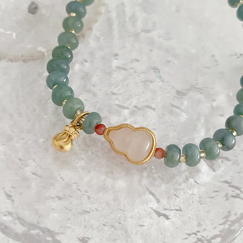 Armband Erdbeerquarz Perle Fu-Zeichen grüne Jade Perlen Gold elegant.
